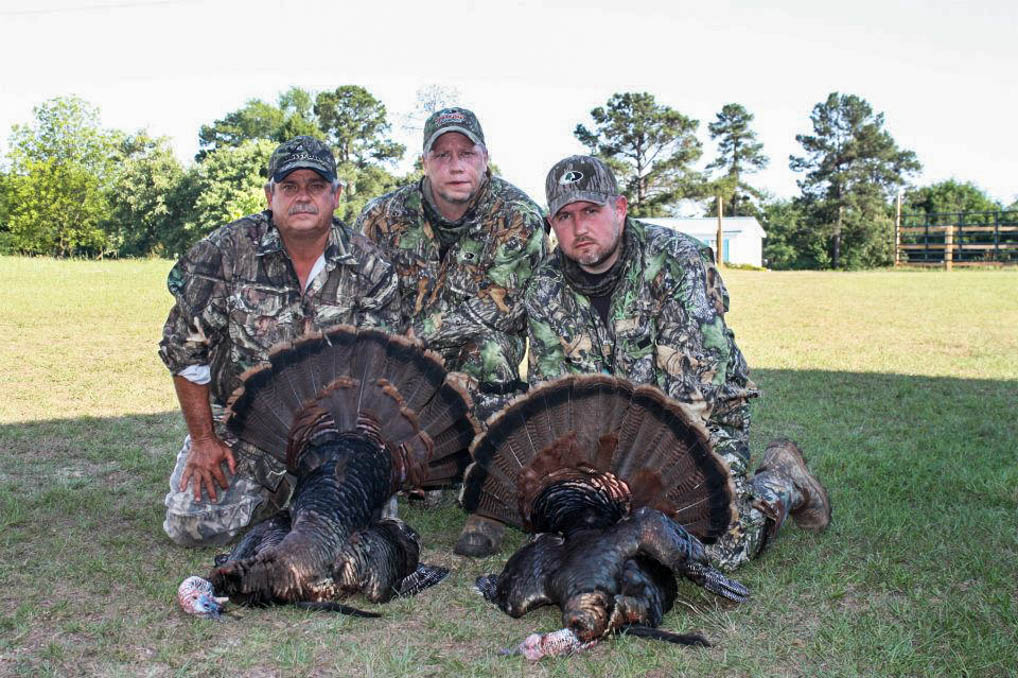 Eric and Matt with their late season turkeys